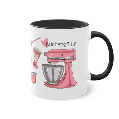 a black and white coffee mug with a pink mixer