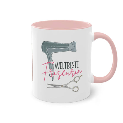 a pink and white coffee mug with scissors on it