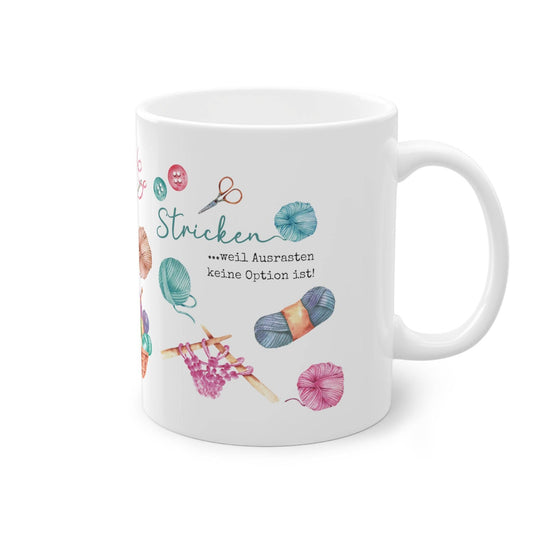 a coffee mug with a picture of knitting items on it