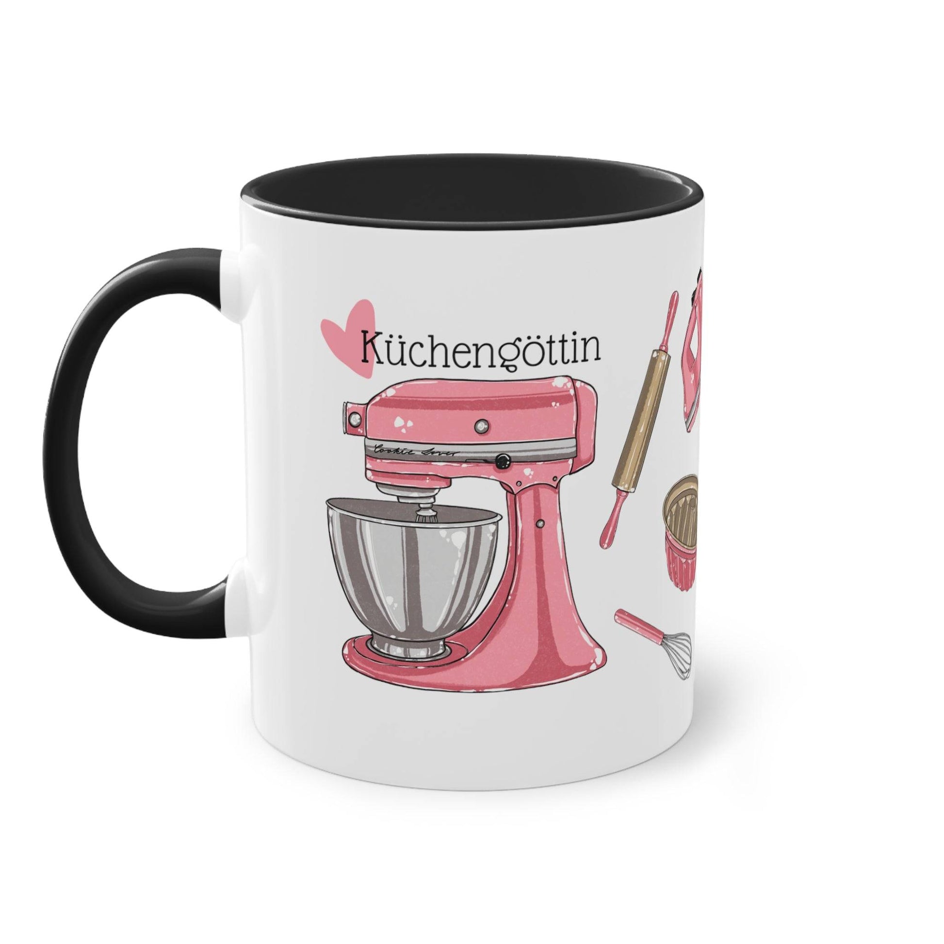 a coffee mug with a pink mixer on it