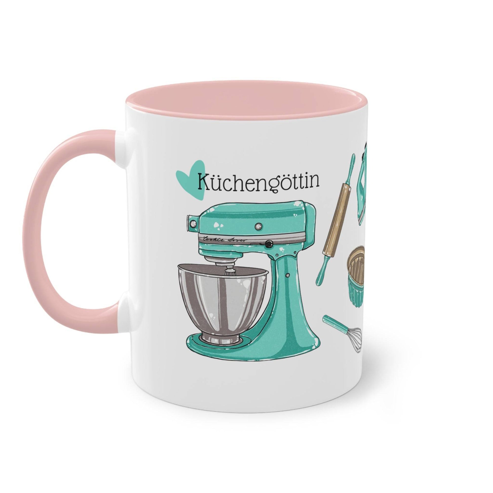 a pink and white coffee mug with a blue mixer on it