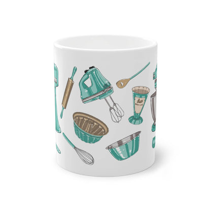 a coffee mug with kitchen utensils on it