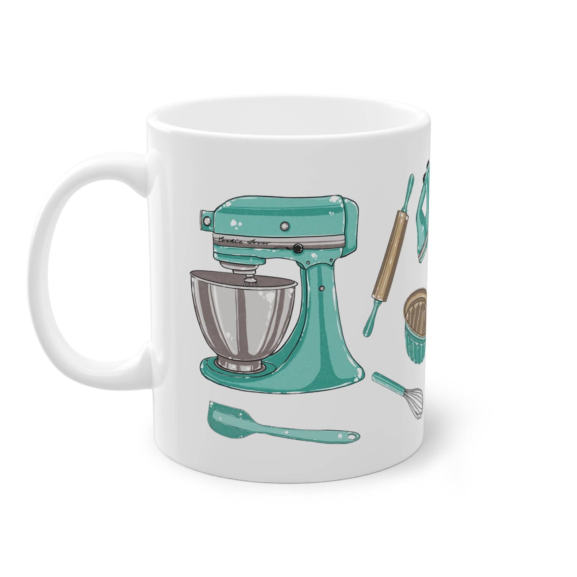 a coffee mug with a mixer on it